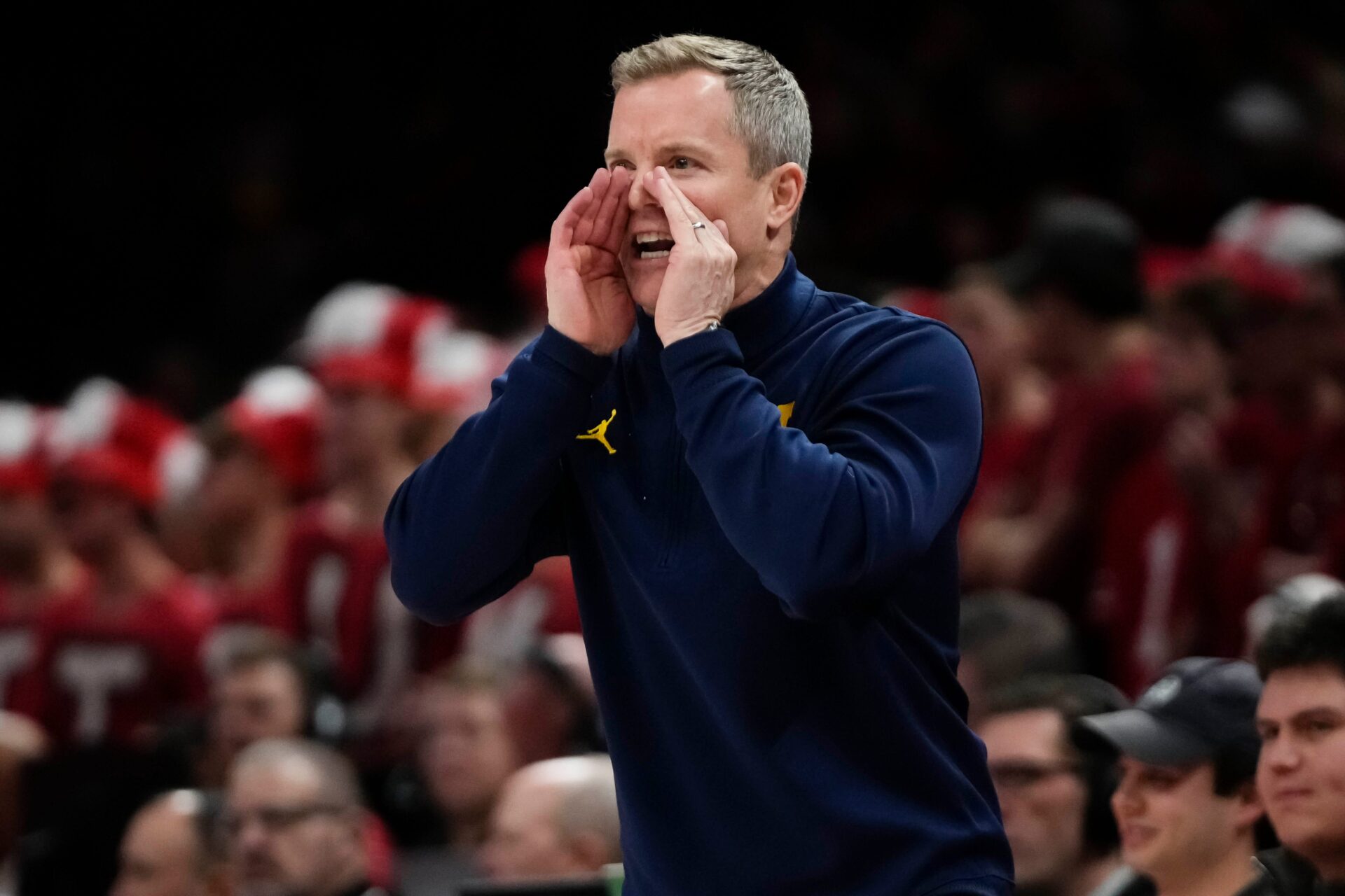 Michigan Wolverines head coach Dusty May yells to his team during the first half of the NCAA men's basketball game against the Ohio State Buckeyes at the Schottenstein Center in Columbus on Feb. 8, 2026.