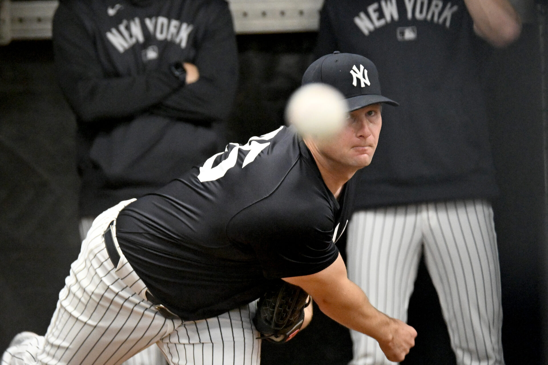 New York Yankees pitcher Gerrit Cole (45)  throws a pitch during spring training at George M. Steinbrenner Field.