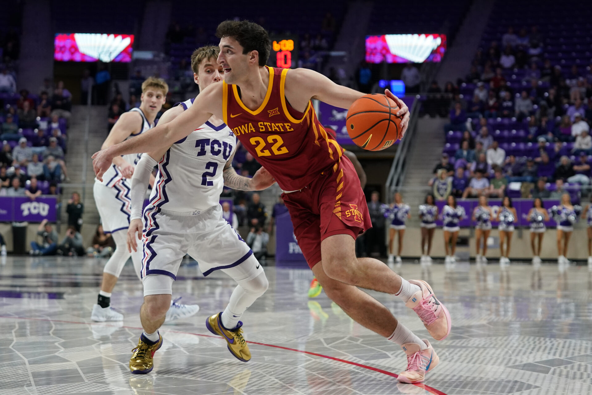Iowa State Cyclones forward Milan Momcilovic (22) drives on TCU Horned Frogs guard Brock Harding (2) during the second half at Ed and Rae Schollmaier Arena.