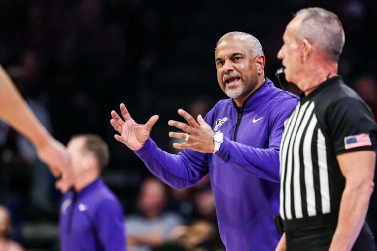 Kansas State Wildcats head coach Jerome Tang yells out to teammates during the first half of the game against the Arizona Wildcats at McKale Memorial Center.