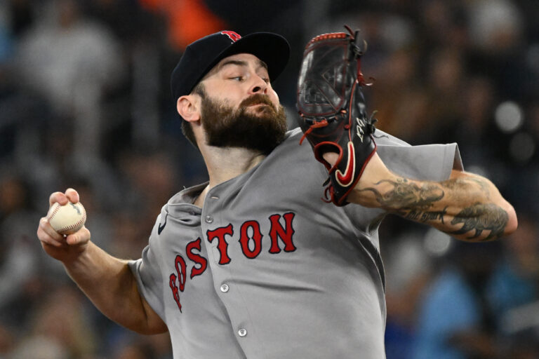 Boston Red Sox starting pitcher Lucas Giolito (54) delivers a pitch against the Toronto Blue Jays in the first inning at Rogers Centre.