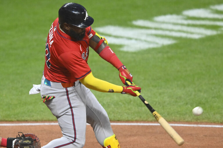 Atlanta Braves designated hitter Marcell Ozuna (20) doubles in the fifth inning against the Cleveland Guardians at Progressive Field.