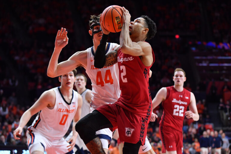 Wisconsin Badgers guard Nick Boyd (2) drives to the basket against Illinois Fighting Illini forward Zvonimir Ivisic (44) during the second half at State Farm Center.