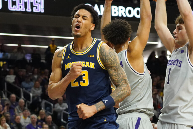 Michigan Wolverines forward Yaxel Lendeborg (23) reacts after scoring against the Northwestern Wildcats during the first half at Welsh-Ryan Arena.