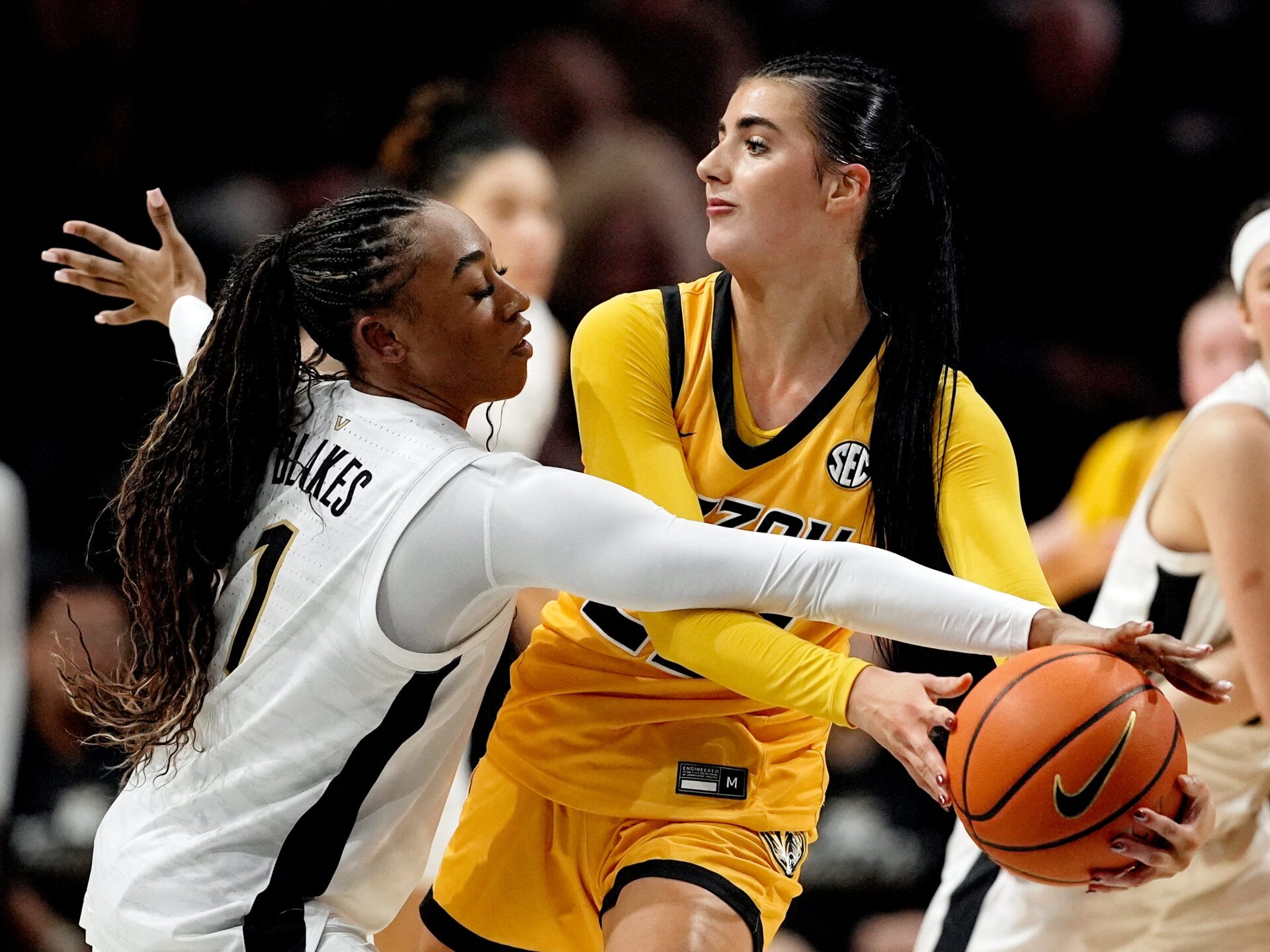 Missouri guard Chloe Sotell (22) is defended by Vanderbilt guard Mikayla Blakes (1) during the first half of an NCAA college basketball game at Memorial Gymnasium Thursday, Jan. 8, 2026, in Nashville, Tenn.